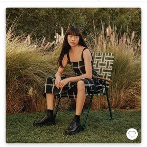 Women’s platted sleeveless buckle back dress